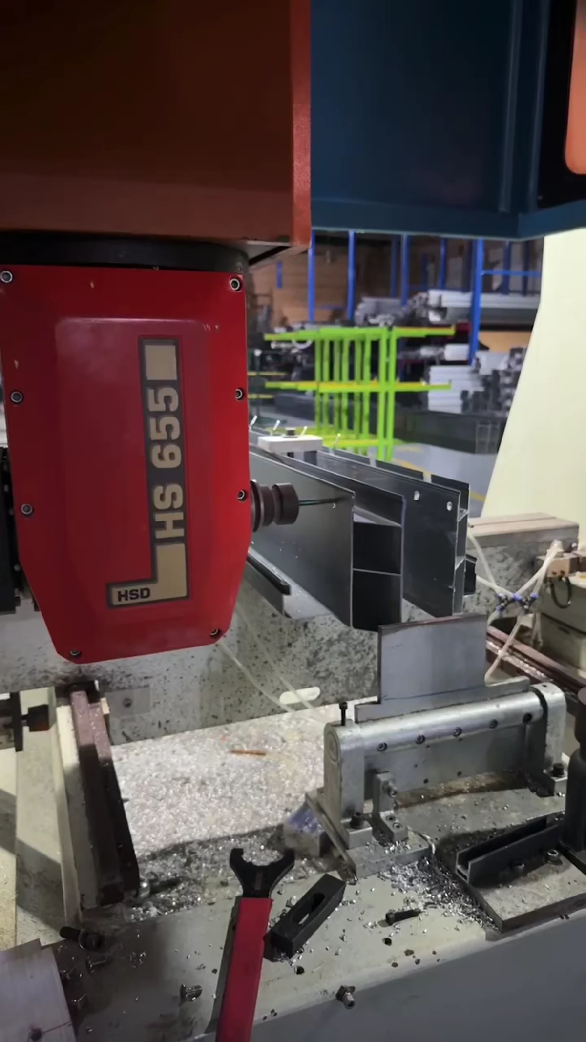 CNC equipment machining a charcoal pergola aluminum component
